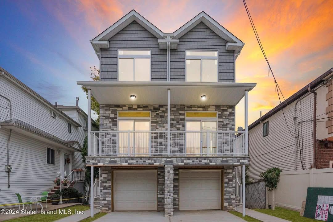 26 Slater Boulevard — new construction exterior at dusk